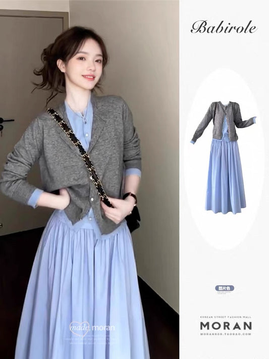Korean-style early autumn outfit: a gray two-piece knitted cardigan, top, and skirt set for women, exuding elegance and youthful charm.