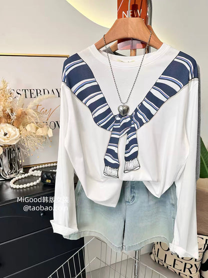 Recommended: A stylish, loose-fitting, and relaxed long-sleeve T-shirt for women—perfect for autumn. It features a trendy Korean-style design with a chic draped-shoulder effect and a unique print.