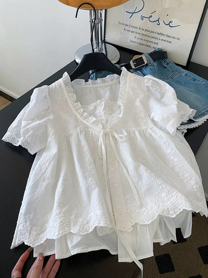 Self-retained model recommendation ~ French embroidered lace white fake two-piece shirt female 2025 summer short-sleeved lace-up top