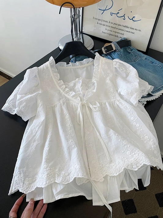 Self-retained model recommendation ~ French embroidered lace white fake two-piece shirt female 2025 summer short-sleeved lace-up top