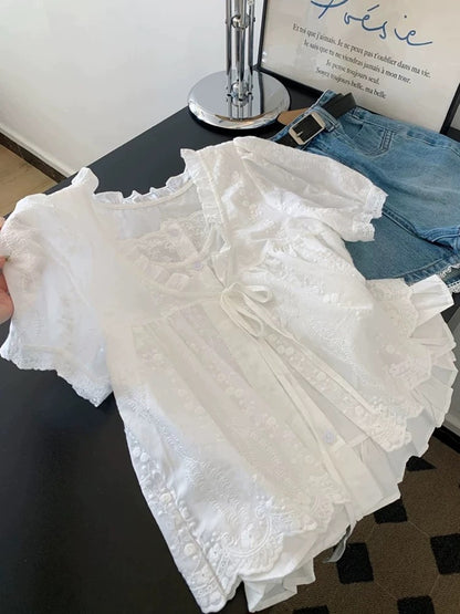 Self-retained model recommendation ~ French embroidered lace white fake two-piece shirt female 2025 summer short-sleeved lace-up top
