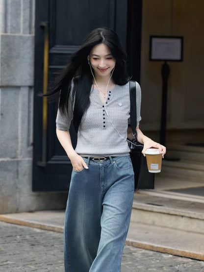 Xia Shiwen Women's Autumn Cable-Knit Half-Placket Top – Merino Wool (16-Gauge), Featuring Contrast Buttons and Sleek Elbow-Length Sleeves.