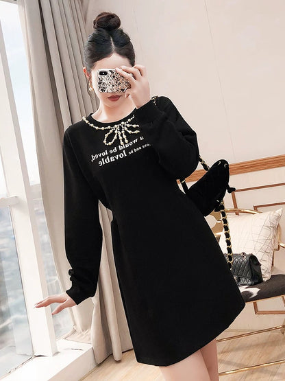 Pinch-waist little black skirt women's 2024 new autumn and winter small black long-sleeved simple and elegant dress