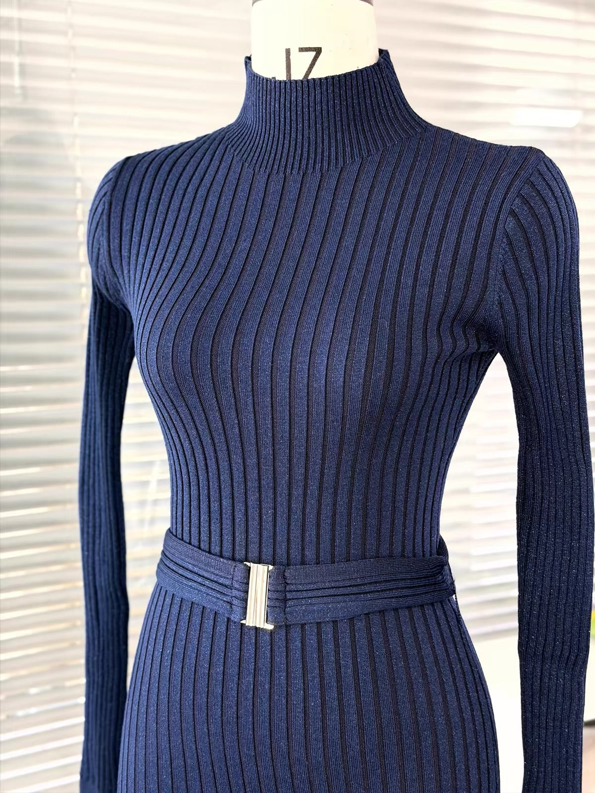 YUANZI "Blue Mist Crystal" – Blue fine-knit vertical-ribbed dress featuring subtle shimmer, a hip-hugging silhouette, and an included waist belt.