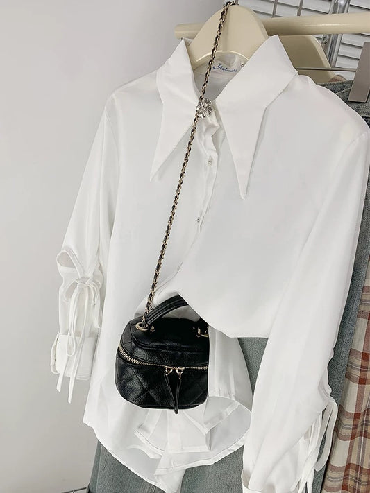 Chic hollow lace-up white shirt for women French fashionable style chiffon long-sleeved top spring and autumn design niche