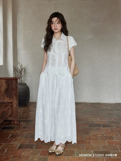 Ximeng 2025 new summer Korean design hollow small niche white short-sleeved shirt skirt suit
