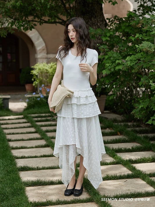 Ximeng 2025 new summer French design skirt irregular niche temperament white splicing short-sleeved dress