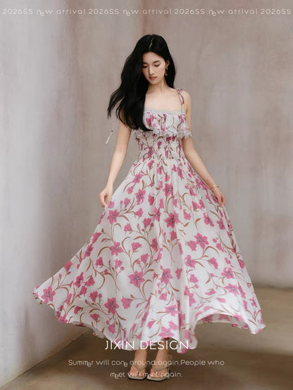 Send a letter featuring a floral print Tencel/linen blend summer vacation sundress with an elastic waist for a slimming effect.