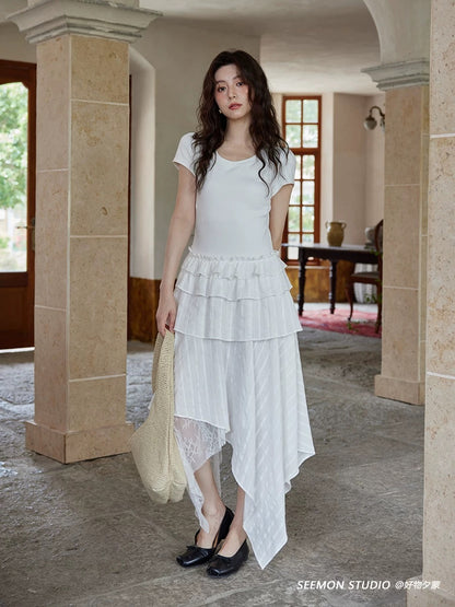 Ximeng 2025 new summer French design skirt irregular niche temperament white splicing short-sleeved dress
