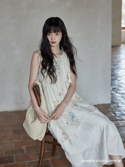 Ximeng 2025 new summer Korean style temperament skirt design niche beautiful print sleeveless apricot dress female