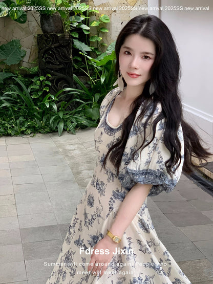 Send a letter to the "Plain Green Grass" vacation-style blue and white botanical print V-neck irregular cotton and linen dress