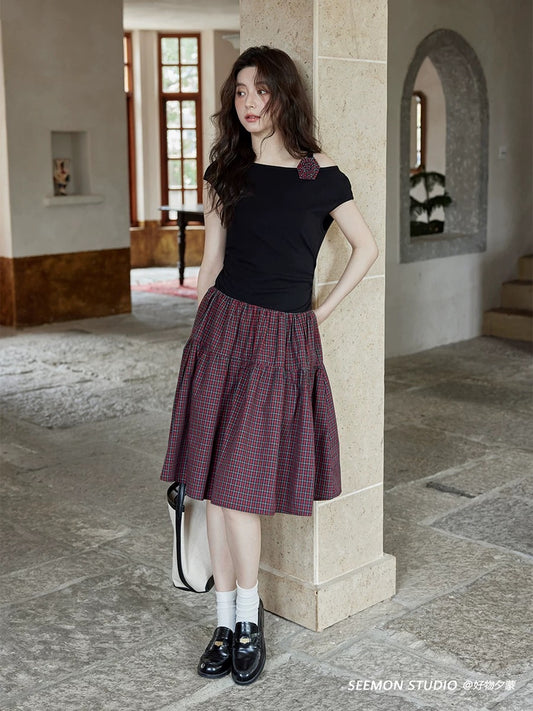Ximeng 2025 new summer Korean style temperament skirt design sense high-end niche unique plaid black dress