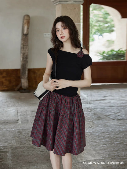 Ximeng 2025 new summer Korean style temperament skirt design sense high-end niche unique plaid black dress
