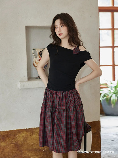 Ximeng 2025 new summer Korean style temperament skirt design sense high-end niche unique plaid black dress