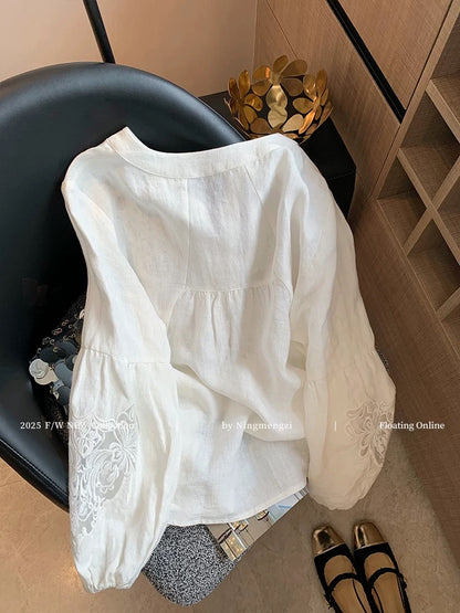 French-style white openwork embroidered linen shirt for women, new spring/summer 2025 style, chic, youthful, and effortlessly stylish.