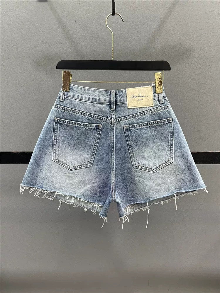 European goods personalized spray-painted denim shorts women 2025 summer high waist loose slim A-line wide-leg pants raw edge hot pants