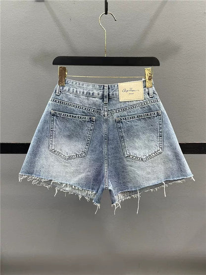 European goods personalized spray-painted denim shorts women 2025 summer high waist loose slim A-line wide-leg pants raw edge hot pants