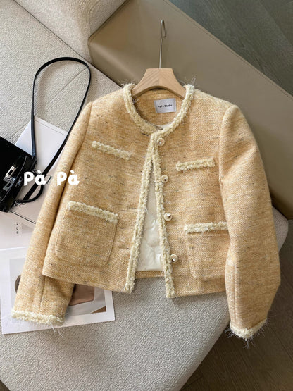 Women's winter short wool tweed coat with sequined trim and a down lining.