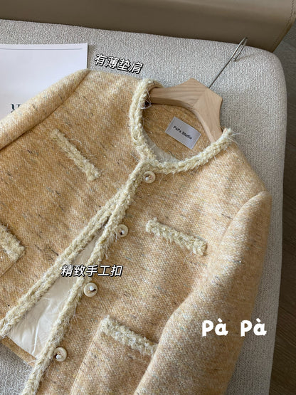 Women's winter short wool tweed coat with sequined trim and a down lining.