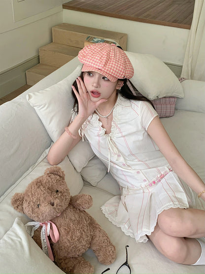 Ruan Ruan's homemade 2024 new summer original niche fungus sweet and western style age-reducing V-neck plaid dress