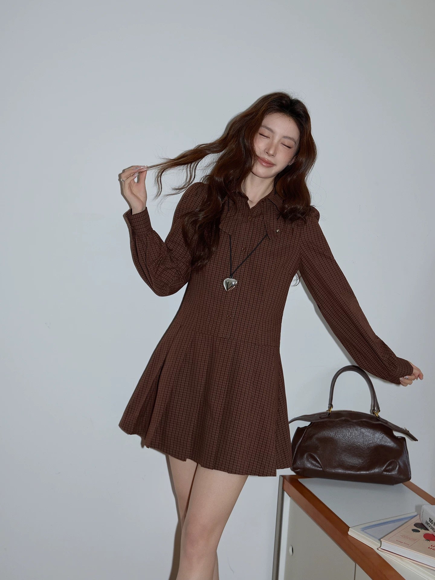 Chaochao's sophisticated brown plaid dress, spring 2026, elegant slim fit, lapel, long sleeves, A-line skirt.