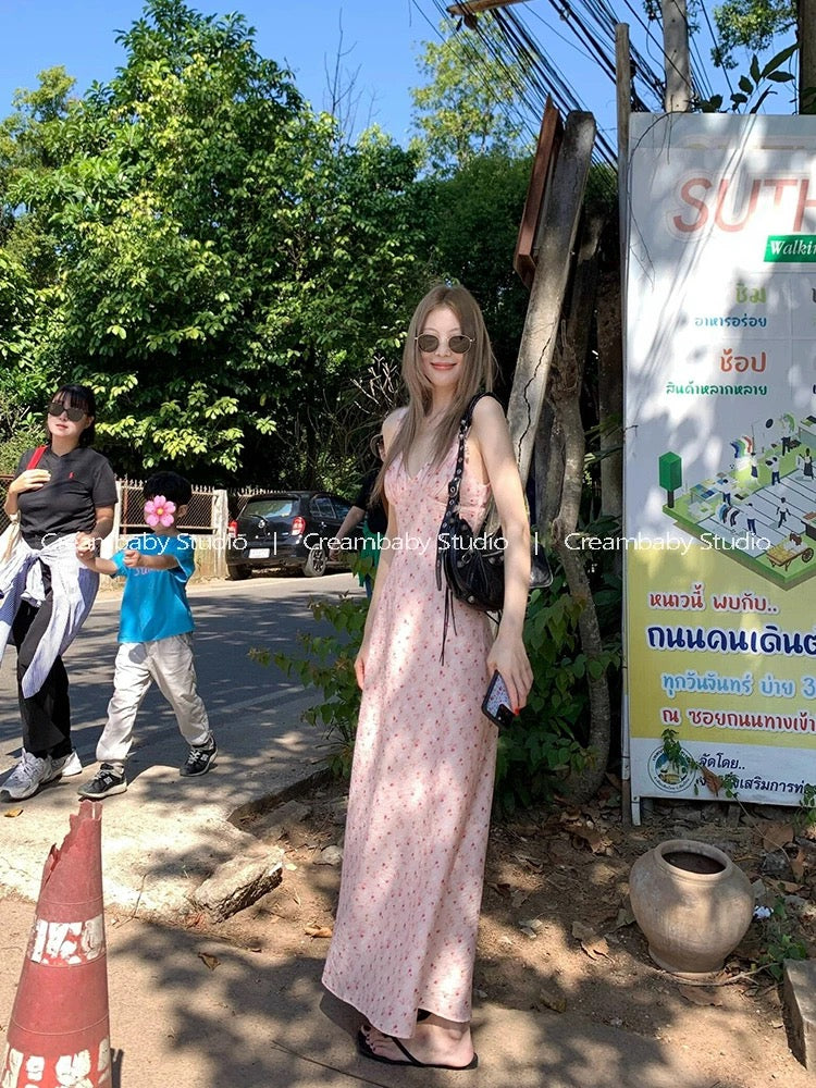 Creambaby Studio's chic and gentle pink V-neck floral print sundress for women, exuding a sophisticated summer vibe.