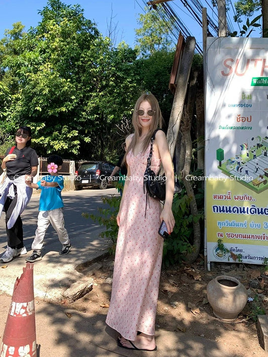 Creambaby Studio's chic and gentle pink V-neck floral print sundress for women, exuding a sophisticated summer vibe.