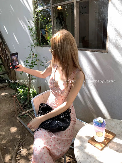 Creambaby Studio's chic and gentle pink V-neck floral print sundress for women, exuding a sophisticated summer vibe.