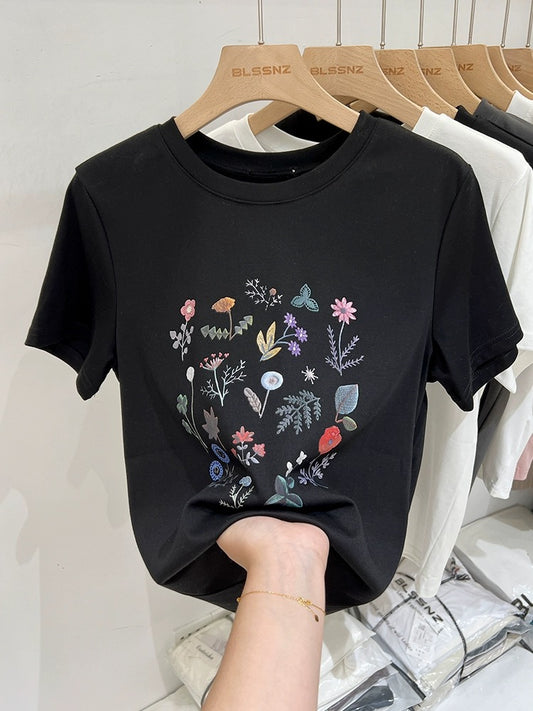White round neck, right shoulder, short-sleeved t-shirt for women 2024 new summer design, loose and stylish printed tops and T-shirts