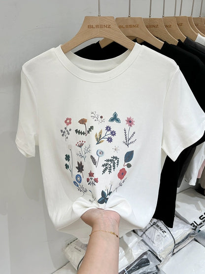 White round neck, right shoulder, short-sleeved t-shirt for women 2024 new summer design, loose and stylish printed tops and T-shirts