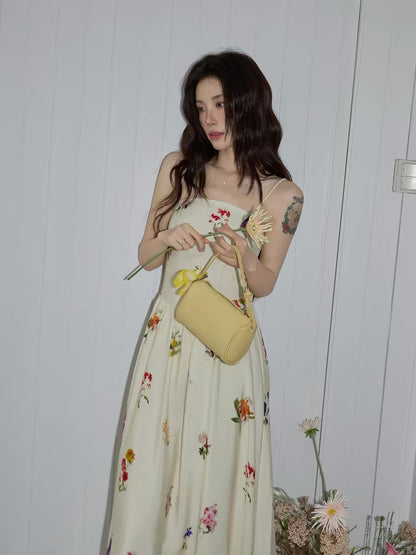 Chaochao's French-style apricot floral sundress for women, 2026 summer, high-end slimming A-line long skirt.