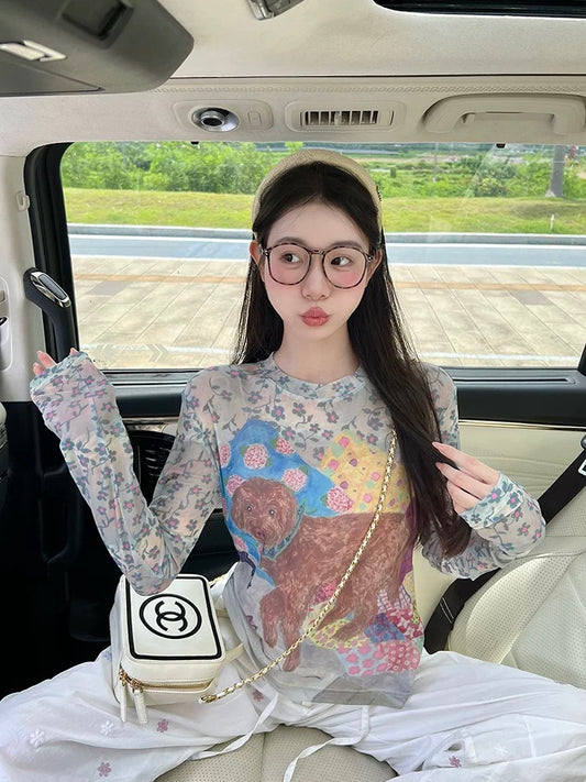 Graffiti puppy print mesh long-sleeved T-shirt for women in autumn, new design, slightly transparent, age-reducing sunscreen top
