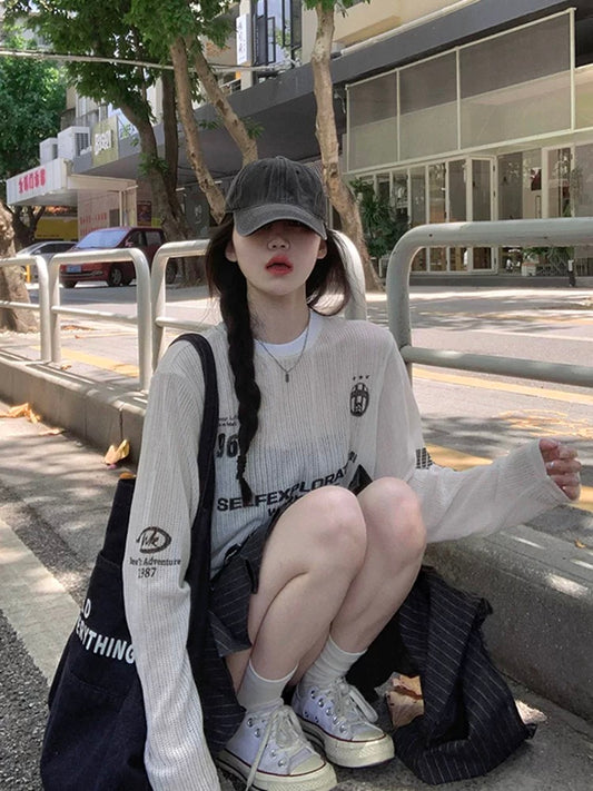 Hollow knitted long-sleeved printed cardigan T-shirt for women in summer, new American style design, loose and slim niche top