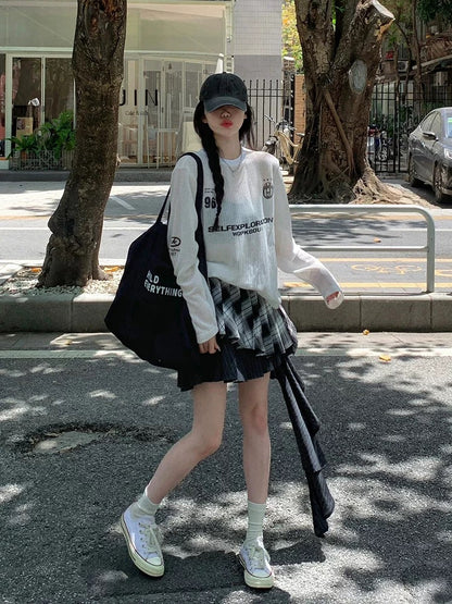 Hollow knitted long-sleeved printed cardigan T-shirt for women in summer, new American style design, loose and slim niche top