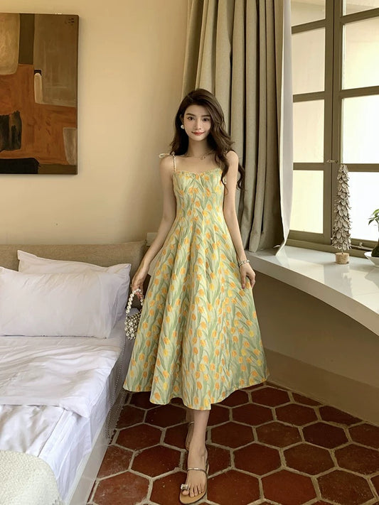 Deng Liuliu French retro oil painting long skirt seaside holiday beach skirt yellow floral suspender dress female spring and summer