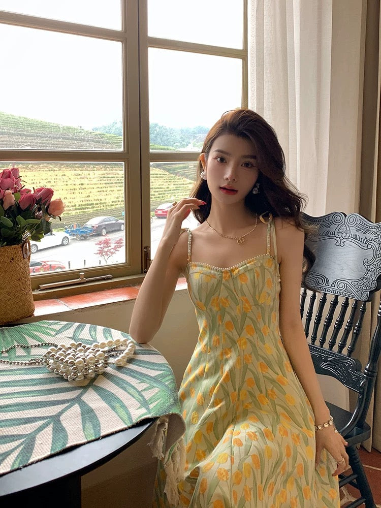 Deng Liuliu French retro oil painting long skirt seaside holiday beach skirt yellow floral suspender dress female spring and summer