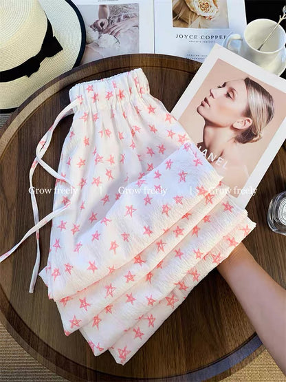 Grow freely hand-painted pink star print drawstring casual pants, new summer style, straight leg, high waist, wide leg pants for women.