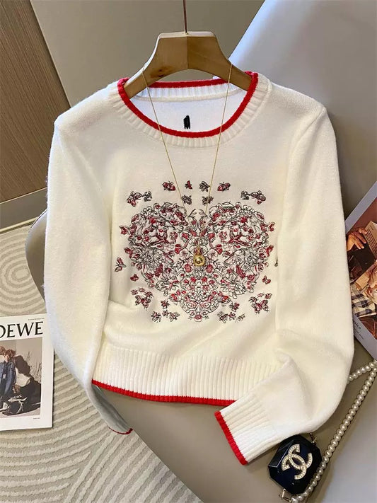 Heavy-duty butterfly and heart embroidered knit sweater for women, autumn and winter 2025 new style, white soft and smooth color-blocked round neck top.