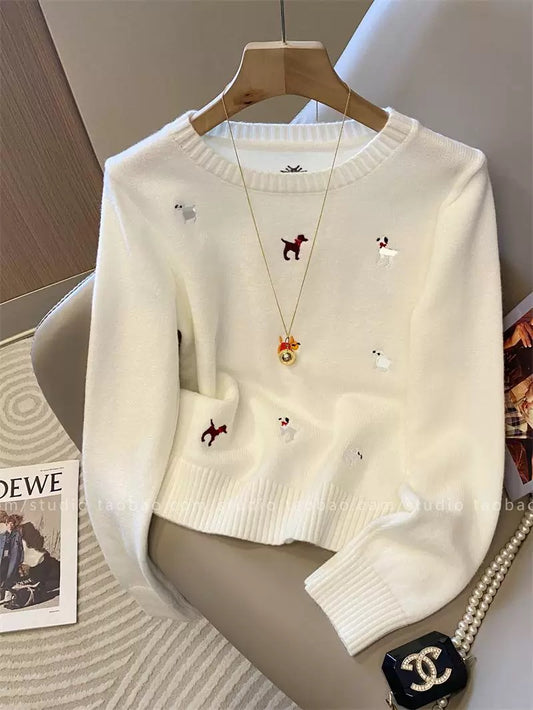 Stylish and youthful white long-sleeved knit top with puppy embroidery, new autumn 2025 style, elegant round neck top for women.