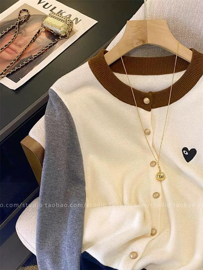 European-style soft and plush round neck color-blocked knitted cardigan for women, new autumn/winter 2025 style, dark blue, versatile long-sleeved top.