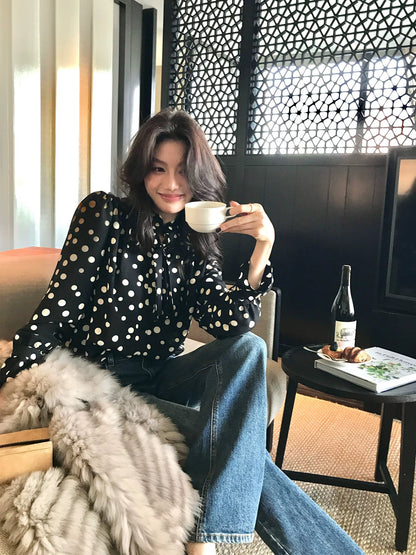 Long Xier, a niche design, featuring a gentle polka dot print lace shirt with a flowing collar, perfect for wearing outside. J380