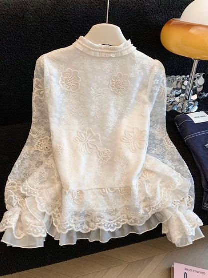 French-style high-end lace embroidered blouse for women, new spring 2026 style, unique ruffled trim, long-sleeved top.