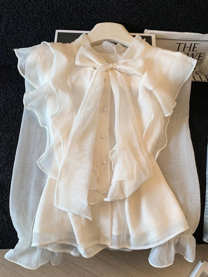 A must-have! ~ Women's blouse with bow design, new spring 2026 style, elegant and unique ruffled hem.