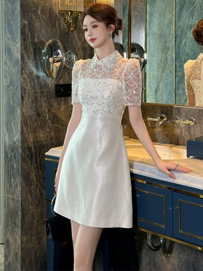 European station white dress for women, summer doll collar, ladylike temperament, high-end luxury, big-name brand satin splicing skirt