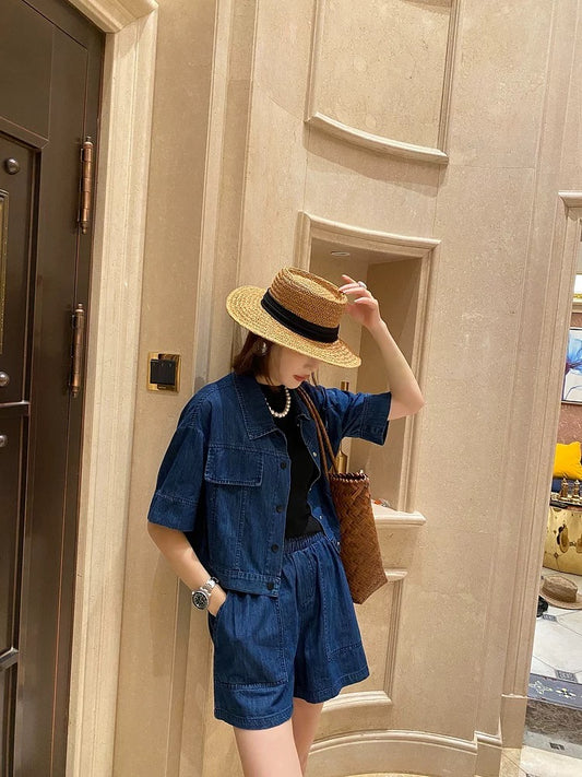 Spreading niche non-colliding denim suit for women summer 2024 new short-sleeved top + wide-leg shorts two-piece set