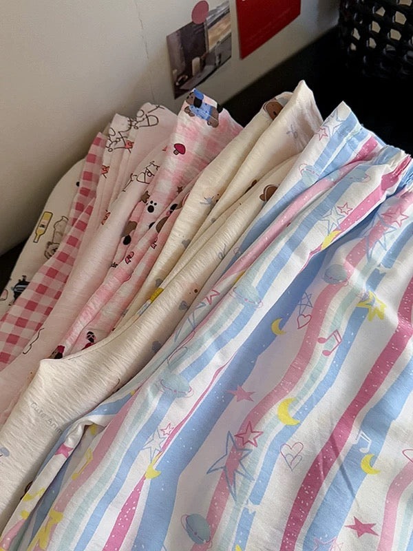 Age-reducing cartoon floral casual pants 2025 spring and summer new Korean women's clothing Western-style pajamas versatile wide-leg trousers trend