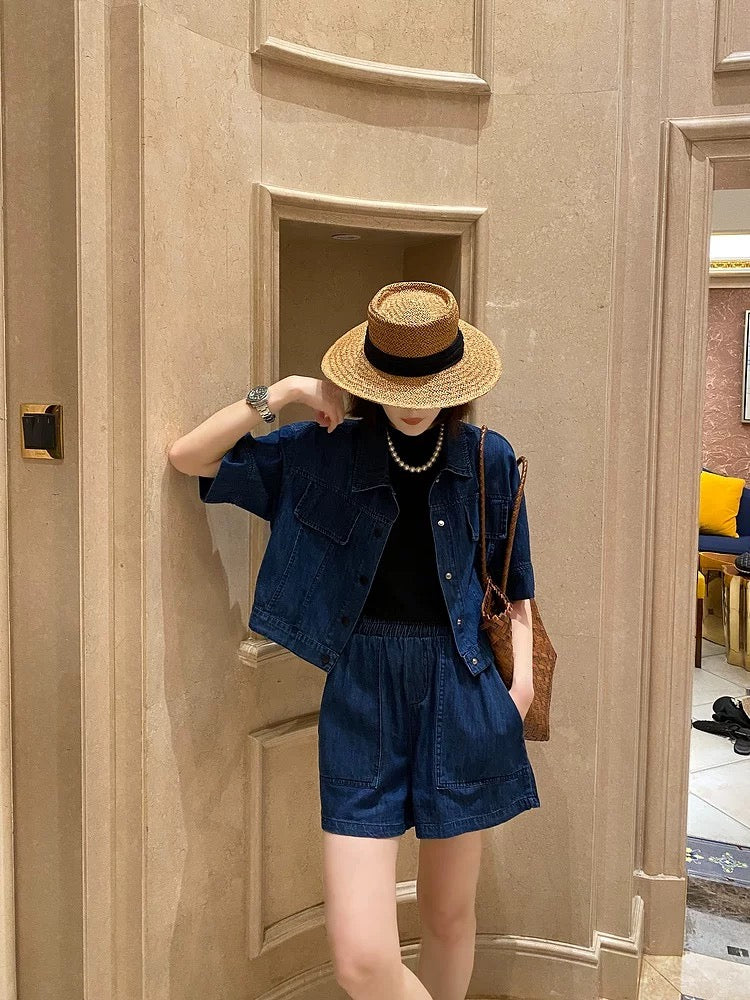 Spreading niche non-colliding denim suit for women summer 2024 new short-sleeved top + wide-leg shorts two-piece set