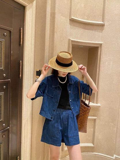 Spreading niche non-colliding denim suit for women summer 2024 new short-sleeved top + wide-leg shorts two-piece set
