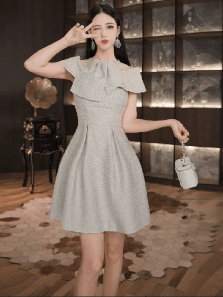 European station niche dress women's summer small high-end slimming temperament super good-looking waist A-line skirt
