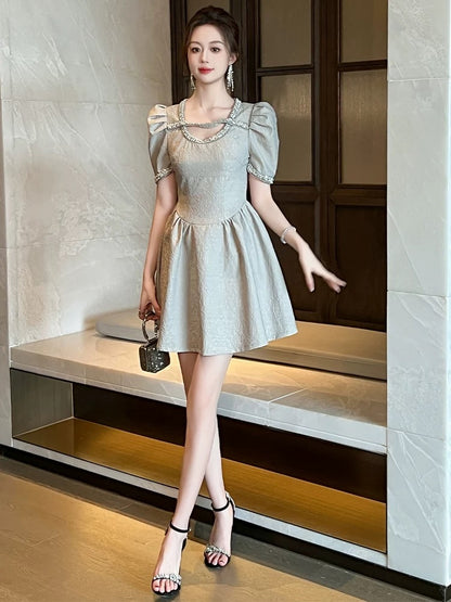 European station design dress women's summer new niche high-end light luxury waist style fluffy a-line skirt